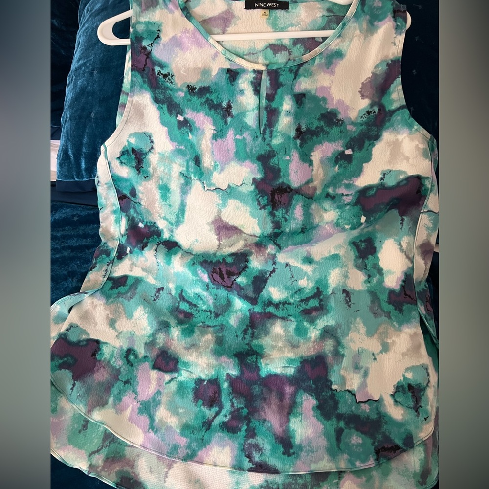 Two Nine West sleeveless blouses.